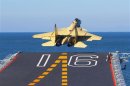 Undated handout photo show a carrier-borne J-15 fighter jet taking off from the Liaoning, China's first aircraft carrier