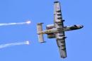 A US Air Force A-10 Thunderbolt II fires flare shells during Air Power Day at the US airbase in Osan, south of Seoul, on October 12, 2008
