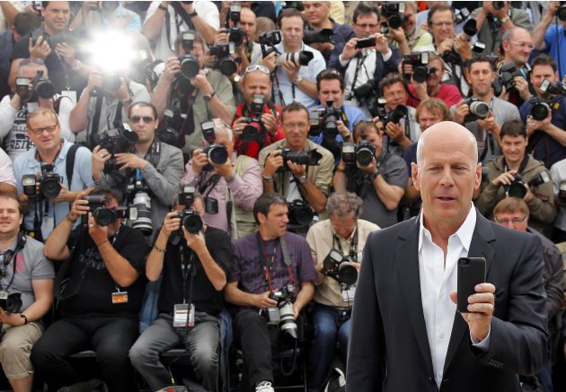 Cast member Willis poses during a photocall at the 65th Cannes Film Festival,