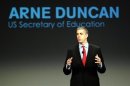 Secretary of Education Duncan addresses a crowd of teachers and politicians during an event to bring physical activity back to schools, in Chicago