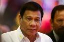 Philippines President Rodrigo Duterte leaves the opening ceremony of the ASEAN Summit in Vientiane