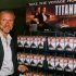 James Cameron, producer, director, and writer of the hit movie Titantic, stands next to a display of..