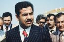 The Iraqi prime minister's spokesman has resigned after a video emerged of him singing praises for Saddam Hussein