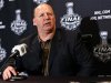 Bruins head coach Claude Julien answers a question from a reporter in Chicago