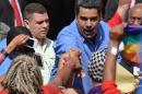 Venezuelan President Nicolas Maduro shakes hands with supporters during a rally with women in Caracas on May 24, 2016