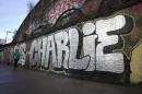 A graffiti that reads 'Je suis Charlie' (I am Charlie) is seen in east London on January 10, 2015