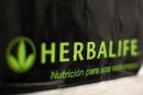 An Herbalife logo is shown on a poster at a clinic in the Mission District in San Francisco
