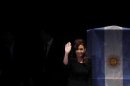 Argentina's President De Kirchner waves during the inauguration of a university in Buenos Aires