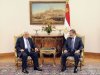 In this photo, released by the Egyptian Presidency, Palestinian President Mahmoud Abbas, left, meets with  Egyptian President Mohammed Morsi, right, in Cairo Egypt, Tuesday, Nov. 13, 2012. In a meeting in Cairo Tuesday with Western-backed Palestinian President Mahmoud Abbas, Morsi expressed his "full support" for Palestinian plans to seek nonmember state status at the United Nations.(AP Photo/Egyptian Presidency)