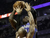 Chicago Bulls' Carlos Boozer (5) tries to block a shot by Orlando Magic's Glen Davis during an NBA basketball game in Chicago on Tuesday, Nov. 6, 2012. (AP Photo/Charles Cherney)