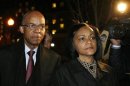U.S. former Rep. Jefferson walks with wife, after his sentencing at U.S. District Court for the Eastern District of Virginia