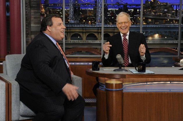 In this photo released by CBS Broadcasting, New Jersey Gov. Chris Christie, left, and late night host David Letterman, right, react with laughter during the Governor's first visit to CBS’ “Late Show with David Letterman,” on Monday, Feb. 4, 2013 in New York. (AP Photo/CBS Broadcasting, Jeffrey Neira)