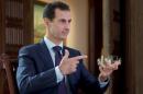 Syria's President Bashar al-Assad speaks during an interview with Denmark's TV 2