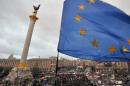 An EU flag flies on November 29, 2013 on Independence Square during an opposition protest in Kiev