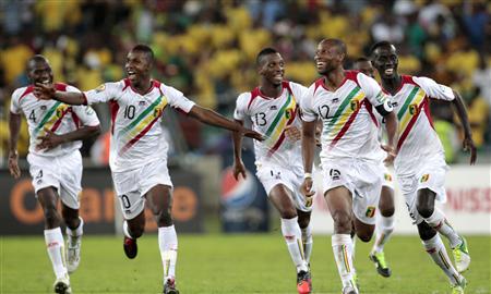 Mali's captain Seydou Keita (12) celebrates with his teammates following their victory over South Africa during their African Cup of Nations (AFCON 2013) quarter-final soccer match at the Moses Mabhida stadium in Durban, February 2, 2013. REUTERS/Rogan Ward