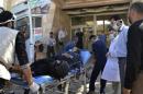 A woman receives treatment at Bab al-Hawa hospital