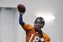 Denver Broncos quarterback Peyton Manning passes during practice Thursday, Jan. 30, 2014, in Florham Park, N.J. The Broncos are scheduled to play the Seattle Seahawks in the NFL Super Bowl XLVIII football game Sunday, Feb. 2, in East Rutherford, N.J. (AP Photo)