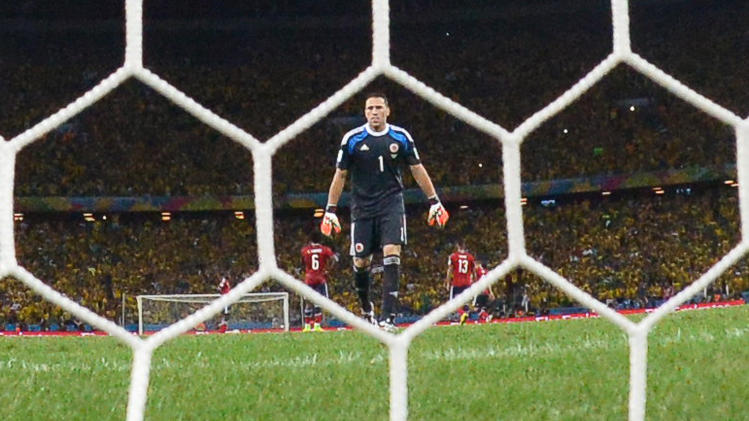 Colombia&#39;s goalkeeper David Ospina reacts during the quarter-final football match between Brazil and Colombia at the Castelao Stadium in Fortaleza during the 2014 FIFA World Cup on July 4, 2014
