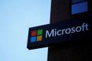FILE PHOTO: A sign marks the Microsoft office in Cambridge