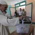 A man casts his vote during presidential elections in Al-Sharqya