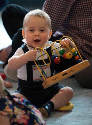 Prince George plays with toys during a visit to the&nbsp;&hellip;