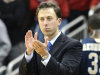 FILE - In this Dec. 19, 2012 file photo, Florida International coach Richard Pitino applauds his team's effort during the second half of an NCAA college basketball game against Louisville in Louisville, Ky. Minnesota is in advanced discussions with Richard Pitino, the son of Louisville coach Rick Pitino, to take over for Tubby Smith. Two people with knowledge of the discussions say Pitino engaged in negotiations with Minnesota officials on Wednesday, April 3, 2013. The people requested anonymity because the deal has not been formally completed. In his lone season at Florida International, Pitino led the Panthers to an 18-14 record, the school's first winning season in 13 years.  (AP Photo/Timothy D. Easley, File)