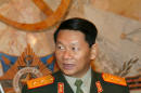 FILE - Laotian Defense Minister, Douangchay Phichit, is seen during a visit to Moscow in this Tuesday, April 27, 2004 file photo. A Laos air force plane believed to be carrying 20 people including the country's defense minister crashed on Saturday May 17, 2014, Thailand's Foreign Ministry said. (AP Photo/File)