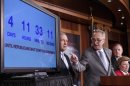 With four days to go before the federal government is due to run out of money, Sen. Charles Schumer, D-N.Y., center, points to a countdown clock during a news conference on Capitol Hill in Washington, Thursday, Sept. 26, 2013, as Senate Democratic leaders blame conservative Republicans for holding up a stopgap spending bill to keep the government running. From left are, Senate Majority Leader Harry Reid of Nev., Schumer, Senate Majority Whip Richard Durbin of Ill., and Senate Appropriations Committee Chair Sen. Barbara Mikulski, D-Md. (AP Photo/J. Scott Applewhite)
