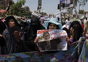 Supporters of Egypt's ousted President Mohammed Morsi …