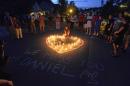 Friends and family of Daniel Harris during a candlelight vigil on Aug. 22 in Charlotte, N.C. (David T. Foster III/The Charlotte Observer via AP)