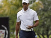 Tiger Woods heads to the 12th tee during a practice round at the Cadillac Championship golf tournament in Doral, Fla., Wednesday March 6, 2013. (AP Photo/Alan Diaz)