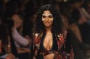 A model shows a creation by Indian designer Rohit Bal