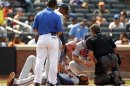 Atlanta Braves Heyward lies on the ground after being hit in the head by a pitch from New York Mets Niese during their MLB National League baseball game in New York