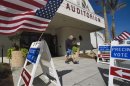 A voter leaves a polling station after casting his ballot in the Florida Republican presidential primary election in Sarasota