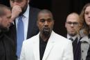 US singer Kanye West leaves St Paul's Cathedral in central London on February 20, 2015 after attending a memorial service for Louise Wilson, former director of the fashion course at London's Central Saint Martins college