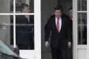 U.S Ambassador to France Charles H. Rivkin, right, leaves the Foreign Ministry in Paris, after he was summoned Monday, Oct. 21, 2013. The French government had summoned the ambassador to explain why the Americans spied on one of their closest allies. Le Monde newspaper said Monday, Oct. 21, 2013 that documents leaked by Edward Snowden show that the U.S. National Security Agency swept up 70.3 million French phone records in a 30-day period. (AP Photo/Claude Paris)