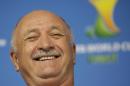 Brazil's coach Luiz Felipe Scolari laughs during a press conference one day before the group A World Cup soccer match between Brazil and Croatia at the Itaquerao Stadium in Sao Paulo, Brazil, on Wednesday, June 11, 2014. (AP Photo/Felipe Dana)