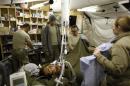 U.S. MAJ. David R. King MD, Chief of Surgical Services of 125 BSB Forward Surgical Team Task Force Mustang, controls his patience after he operated on him in Forward Operating Base Shank in Logar province