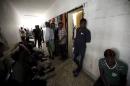 Illegal migrants are seen in a detention center in Misrata,