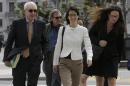 Ellen Pao, center, walks to Civic Center Courthouse in San Francisco, Friday, March 27, 2015. The jury are due back in court on Friday in Pao's lawsuit against Kleiner Perkins Caufield & Byers. Pao says the firm discriminated against her because she was a woman and then retaliated by denying her a promotion and firing her when she complained about gender bias. Kleiner Perkins denies the allegations. (AP Photo/Jeff Chiu)