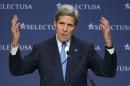 Secretary of State John Kerry gestures while speaking at the SelectUSA Investment Summit, hosted by the Commerce Department, Tuesday, March 24, 2015, in National Harbor, Md. (AP Photo/Cliff Owen)