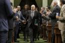 Calif., Gov. Jerry Brown is greeted by lawmakers as he enters the Assembly to deliver his annual State of the State address to a joint session of the state Legislature Tuesday, Jan. 24, 2017, in Sacramento, Calif. (AP Photo/Rich Pedroncelli)