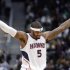 Atlanta Hawks forward Josh Smith reacts after a Hawks basket in the second half of an NBA basketball game against the Boston Celtics on Friday, Jan. 25, 2013, in Atlanta. Atlanta won 123-111 in double-overtime. (AP Photo/John Bazemore)