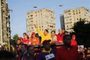 Venezuela's President and Presidential candidate Chavez waves to supporters during a campaign rally in Guarenas in the state of Miranda