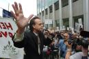 Marc Emery addresses a crowd at an anti-extradition rally held for him in front of the U.S. Consulate on September 10, 2005 in Vancouver, Canada