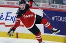 Canada's Max Domi celebrates after scoring the fifth goal against the United during the third period of a round-robin game at the world junior ice hockey championship Wednesday, Dec. 31, 2014, in Montreal. Canada won 5-3. (AP Photo/The Canadian Press, Ryan Remiorz)