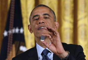 U.S. President Obama holds up a SanDisk data storage&nbsp;&hellip;