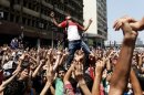 Morsi supporters chant slogans in Ramses Square before clashes erupted with Egyptian security forces. 