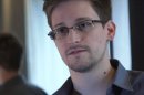 U.S. National Security Agency whistleblower Edward Snowden is seen in this still image taken from a video during an interview with the Guardian in his hotel room in Hong Kong
