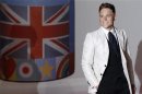 British singer Olly Murs arrives for the BRIT Music Awards at the O2 Arena in London